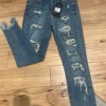 Black Label Distressed Jeans Photo 0
