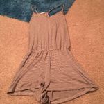 Brandy Melville Black and cream striped racer back romper Photo 0