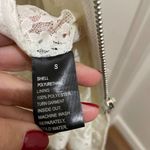 Cristina White Faux Leather Laser Cut With Lace Liner Jacket Photo 6