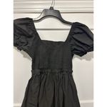 Princess Polly  Women’s Short Mini Dress Black Open Back Tie Back Size 4 Smocked Photo 1