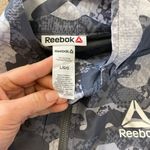 Reebok NWT  Ladies Woven Print Quarter Zip Windbreaker with pocket Photo 4