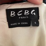 BCBG Paris Gold with black trim cocktail mini dress Gold Size 4 Photo 7