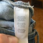 Chico's Chico’s distressed pull in medium wash 00/2 travelcore jeggings Photo 2