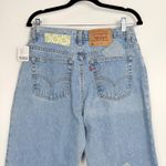 Urban Renewal  Women's Blue Patchwork Festival Levi's 550 Boho Tapered Jeans 24 Photo 8