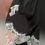 Elegant Black Satin Slip Dress with Lace Trim Photo 8