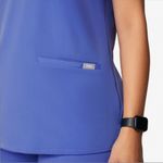 FIGS • casma three pocket scrub top in denim blue sz M Photo 1