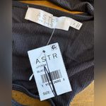 ASTR  The Label Medium Rib Multi Back Cutout Bodysuit In Black Long Puff Sleeve Photo 6