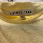 Urban Outfitters  Poppy Graphic T-Shirt Photo 1