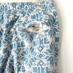 Nike  Sportswear Club Fleece Holiday Sweatpants Blue White Snowflakes Jogger Photo 7