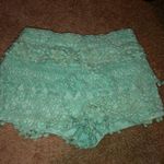 Love Culture Flowy Mint Ruffled Shorts Photo 1