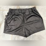 Like an angel  
Black Faux Leather Skirt Photo 1