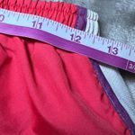 Nike  Dri-FIT Running Shorts Womens Medium Pink White Purple Athletic Gym Photo 9