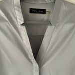 Ivanka Trump  Shimmering blue blouse Photo 1