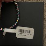 Icing NWT Iridescent Beaded Cross Elastic Bracelet Photo 3