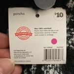 Me Too Black/White Ponco with fringe on edges and solid black cow neck. Photo 6