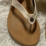 UGG  Cream and Tan Sheepskin Sandals Photo 1