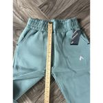 Alphalete  WOMEN'S ELMTS RELAXED CUFFED JOGGER - Teal , Size Medium Photo 7