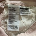 Levi's 721-PINK HIGH RISE-SIZE 25 Light pink high rise skinny jeans, excellent condition Measurements: Waist: side to side 13 inches Inseam: 29 inches Rise: 9 1/2 inches Photo 12