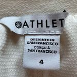 Athleta ivory mini tennis skirt size 4 Photo 4