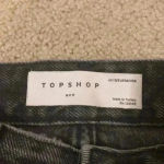 Topshop High rise black ripped  mom shorts in size 6 Photo 4