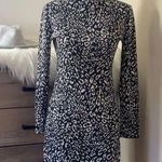 mts boutique • leopard print long sleeve mini dress Black Photo 0