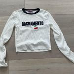 Edikted Long Sleeve White Graphic Top Photo 0
