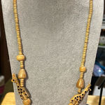 Adorable, BoHo necklace. It has the two cute giraffes and wood beads.​ Photo 0