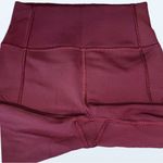 Lululemon (Like New) In Movement Tight 25" *Everlux in Garnet, Size 2 Photo 5
