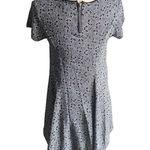 Urban Outfitters -SILENCE + NOISE Adorable black and white fit and glare dress, black tattered gem, short sleeves, back zipper, excellent condition, size small Measurements: Bust: armpit to armpit 16 inches Length: shoulder seam to bottom 29 inches Photo 7