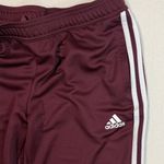 Adidas  Maroon Track Pants with White Stripes Photo 2