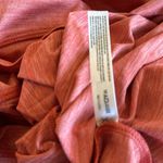 Free People NWOT  movement orange long Sleeve Top with thumbholes Oversize Photo 7