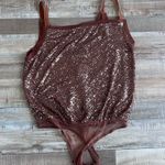 Free People shimmer and shine bodysuit size L Photo 1