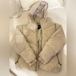 Spyder hooded puffer coat- size M in beige Photo 1