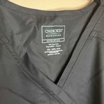 Cherokee  Women's Shaped 3-Pocket Mock Wrap Scrub Top Black 2XL WW610 Photo 1