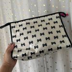 Kate Spade New York Large Tuxedo Bow Tie Heddy Plastic Exterior Cosmetic Bag Photo 2