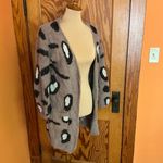 XOXO  fuzzy soft eyelash cheetah cardigan Photo 5