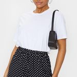 Pretty Little Thing Black Jersey Floaty Polka Dot Shorts Photo 1