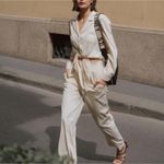 Nanushka Tanya Jumpsuit Size Small Long Sleeve Cut Out Tie Front Cream Photo 4