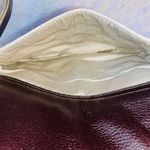 BCBG Max Azria canvas and yellow snakeskin print wristlet Photo 3