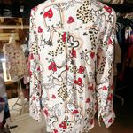  off white shirt long sleeve pockets red hearts evil eyes stars NWT Button up  Available size: S ;; L New with tag  Same day shipping  Smoke and pets free  This Milk & Honey shirt is a must-have for any fashion-forward woman. Featuring a unique design with red hearts, evil eyes, and stars, this shirt is sure to turn heads. It also has long sleeves, a button closure, and pockets, making it both stylish and functional.   The shirt comes in a multicolor pattern and is available in size S and L. Made for all seasons, it is perfect for any occasion. The brand, Milk & Honey, is known for its quality and attention to detail. This shirt is brand new with tags and is sure to be a great addition to your wardrobe.  Photo 5