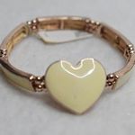 Charming Charlie NWT  Cream Enamel Gold Tone Heart Stretch Y2K Chic Bracelet Photo 0