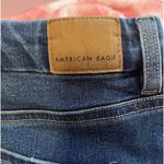 American Eagle  Ultra High-Rise Super Skinny Ripped Denim Blue Jeans Photo 5