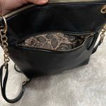 Carlos Santana  black crossbody purse bag Photo 5