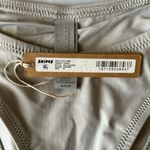 SKIMS  swim bottoms CHEEKY TANGA‎ COLOR CHROME SIZE M NWT Photo 1