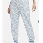 Nike  Sportswear Club Fleece Holiday Sweatpants Blue White Snowflakes Jogger Photo 1