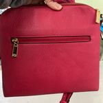 Amazon Faux leather purse in pink. Animal print lining. Good used condition. Photo 2