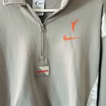 Women's Nike WNBA Fleece Top. 1/4 zip, Size Large. Gray Photo 2