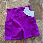 Beyond Yoga Powerbeyond Strive Biker Short Violet Berry Size Medium Photo 6