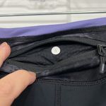 Lululemon Size 8 Black, Purple Crop Ruffle Ankle Trim Leggings with Zip Pocket Photo 7