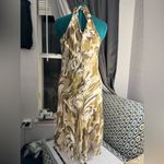 “Chic halter neck dress with a stunning abstract pattern in earthy tones. Tan Size 4 Photo 3